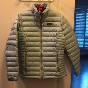 Cozy soft blue with gold trim goose down Patagonia jacket.